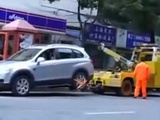 Crazy Asian Lady Drives Off With Tow Truck