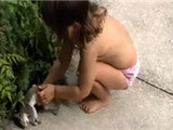 Little Girl Plays With Dead Squirrel